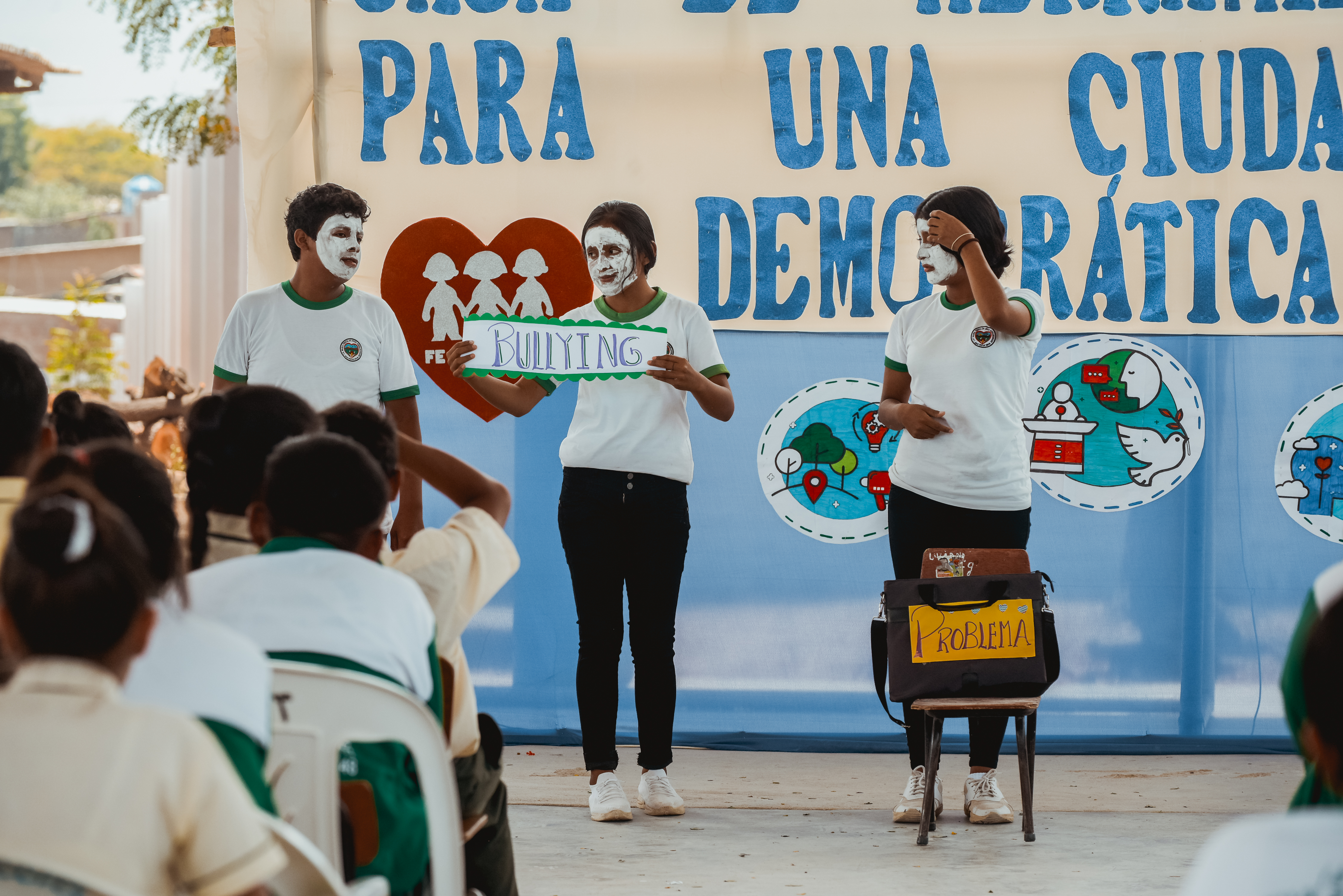 Schoolchildren in Peru present solutions to community issues in November 2023. The initiative was part of an effort to improve democratic citizenship. Credit: International IDEA/Francesca Florián